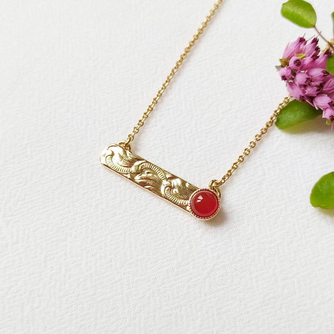 Handmade-gold-plated-short-necklace-for-women-with-a-red-gemstone-made-in-France