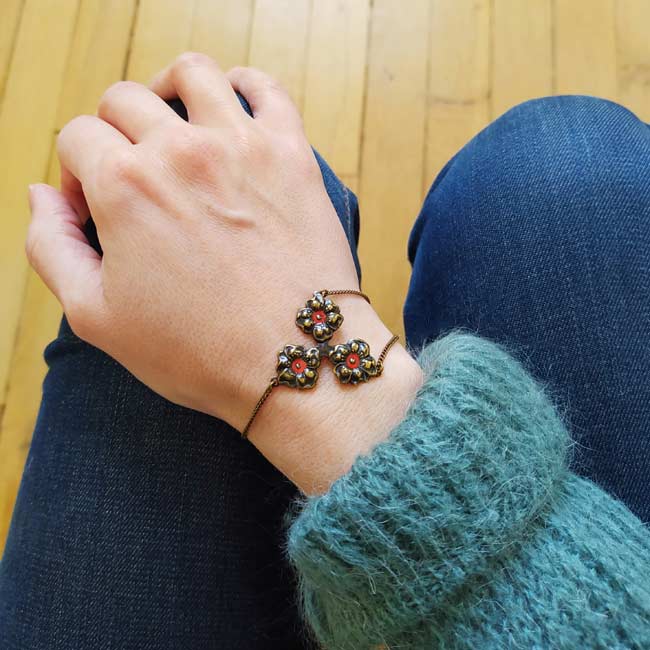 Handmade-bronze-bracelet-for-women-with a-red-flower-made-in-Paris-France