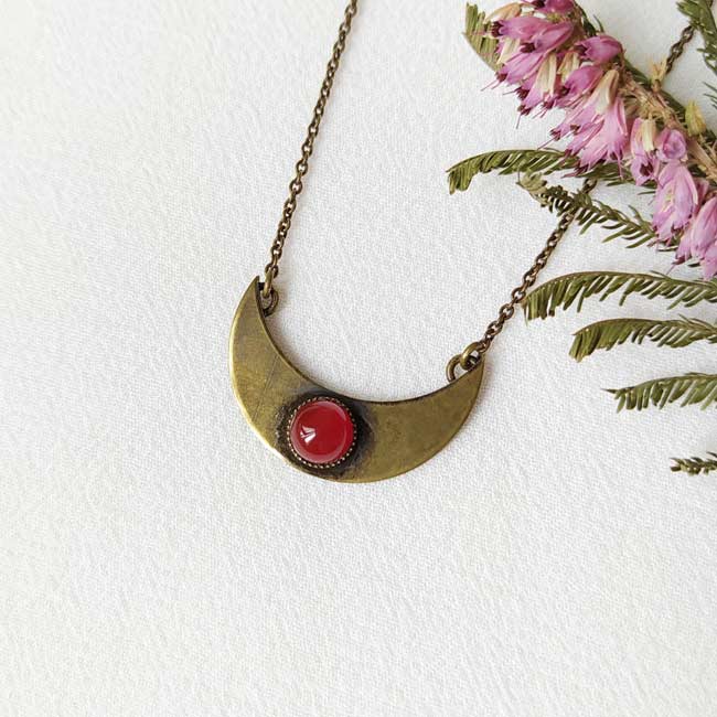 Handmade-antique-brass-necklace-for-women-wih-a-red-gemstone-moon-pendant-made-in-France