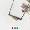 Handmade-bronze-necklace-for-women-with-a-blue-yellow-pendant-made-in-France