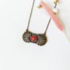 Handmade-bronze-necklace-for-women-with-a-red-gemstone-seashell-made-in-France