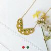 Customed-handmade-gold-necklace-for-women-with-green-enamel-made-in-France
