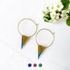 Boucles-d-oreilles-créole-fantaisie-de-créateur-doré-pour-femme-avec-email-bleu-fait-à-Paris