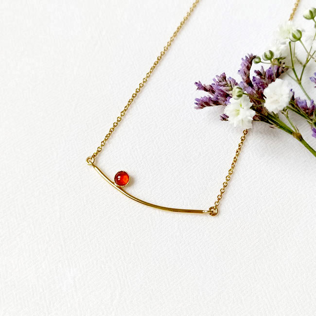 Handmade-gold-plated-short-necklace-for-women-with-a-red-gemstone-made-in-France
