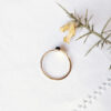Handmade-fashion-customed-gold-adjustable-ring-for-woman-with-a-leaf-with-a-gemstone-in-Paris