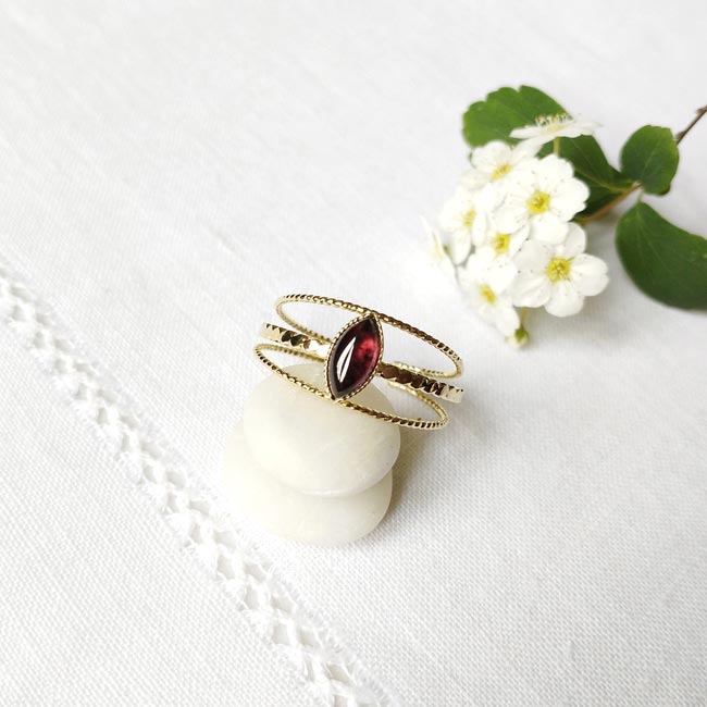 Handmade-fashion-customed-gold-adjustable-ring-for-woman-with-a-plum-garnet-gemstone-in-France