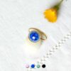 Bague-réglable-de-créateur-fantaisie-artisanal-or-pour-femme-avec-perle-en-céramique-bleu-marine-fait-main-en-Gironde-France